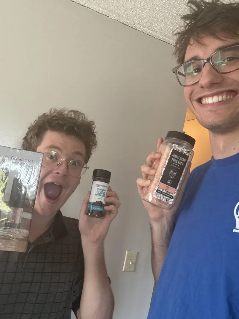 160 Elliot and Duncan holding up their new salt and pepper mills