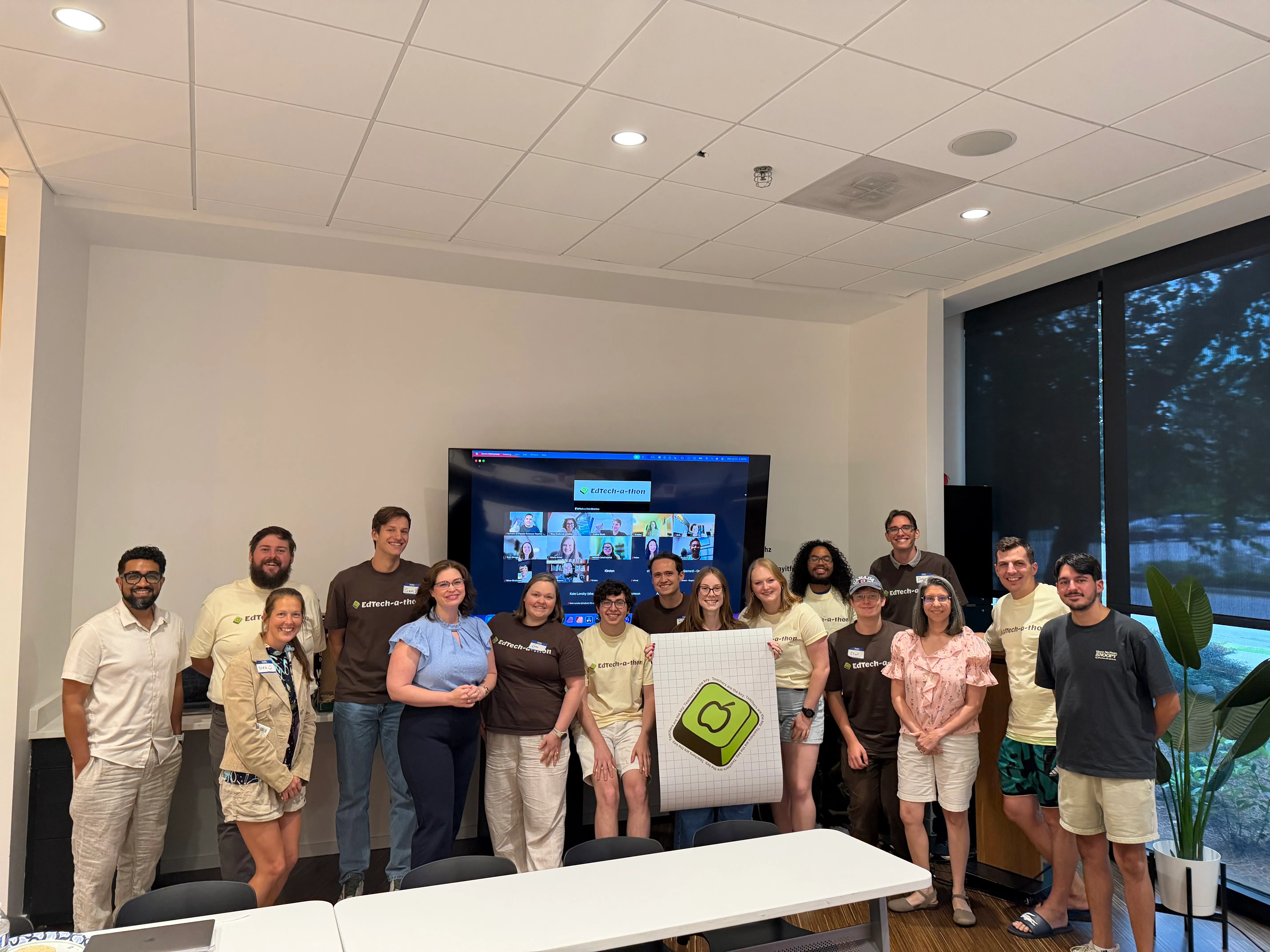 Participants at the 2026 EdTech-a-thon gathered in Atlanta with virtual attendees joining onscreen